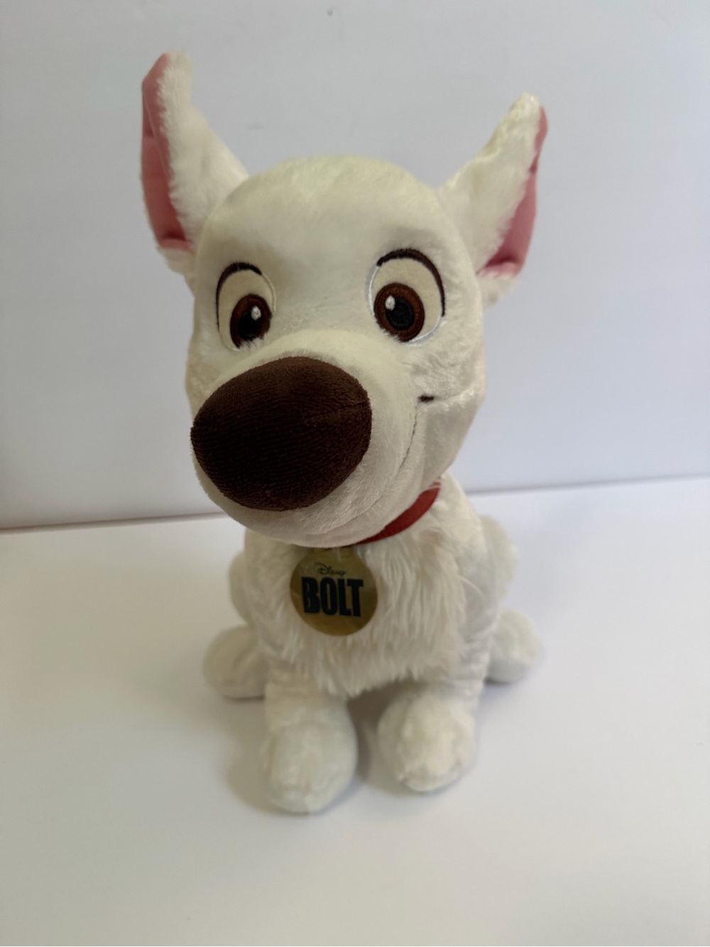 Disney White and Brown Bolt Plush Dog Toy with Red Collar